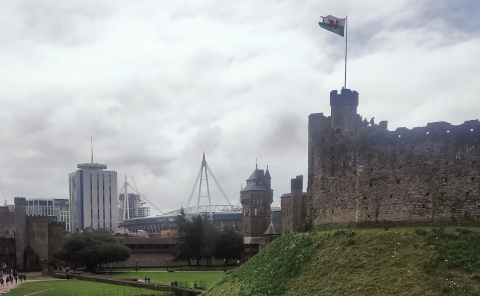 Cardiff castle with Principality Stadium in the background