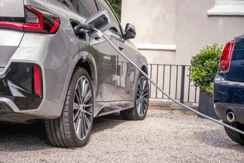 Electric car being charged