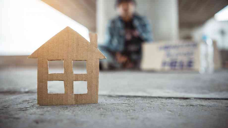 Cardboard cut-out of a house.