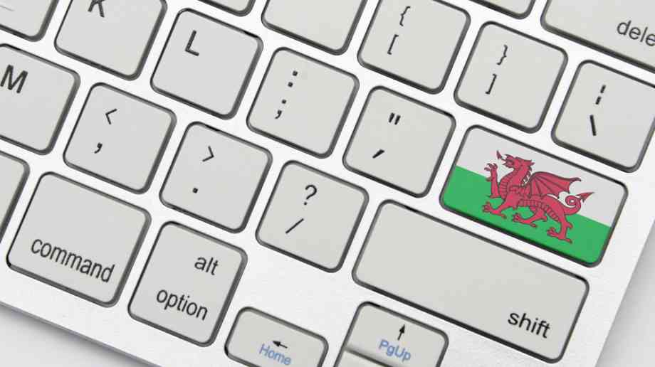 Computer keyboard with Welsh flag.