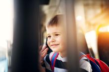 Kid on bus