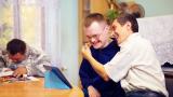 Three adults are spending time in shared housing.