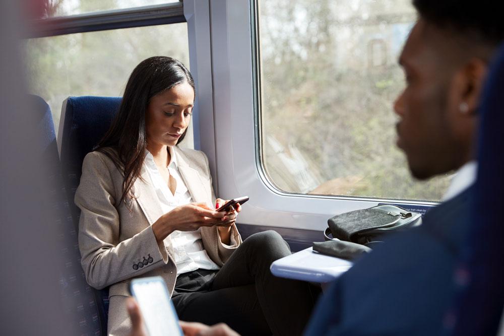 commuters on phones